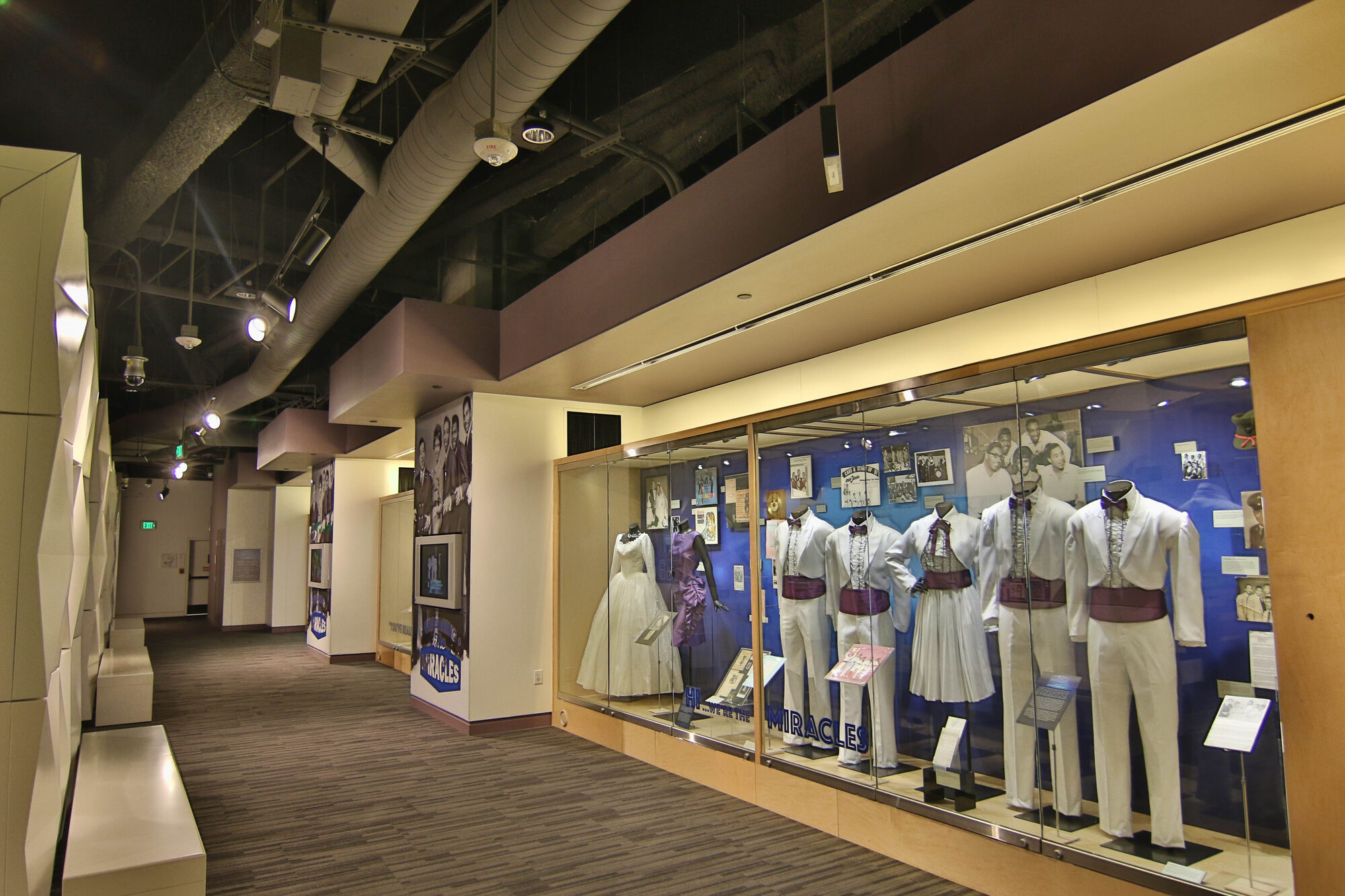 Stage suits and gowns worn by The Miracles displayed in the Legends of Motown gallery