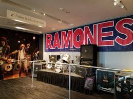 Wide view of the Ramones exhibition and artifact cases
